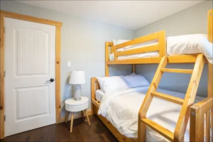 Bunk beds in a clean and comfortable cottage rental bedroom