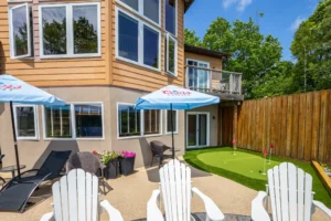 Sterling Point cottage rental exterior with outdoor seating area and private recreational space